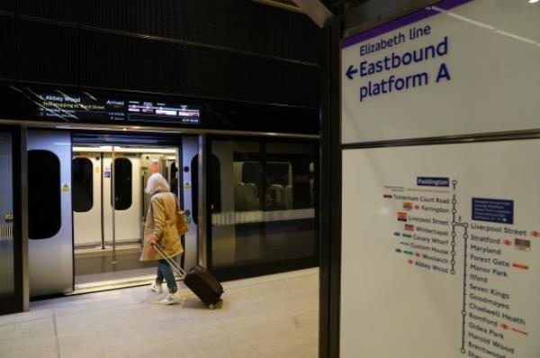 File photo dated 24/05/22 of a passenger boarding an Elizabeth Line carriage at Paddington Station, London, as services on a major section of the line have been suspended because of a swan. Passengers on board trains reported being told the bird was blocking part of the route. PA Photo. Issue date: Thursday June 29, 2023. See PA story TRANSPORT Swan. Photo credit should read: Kirsty O'Connor/PA Wire