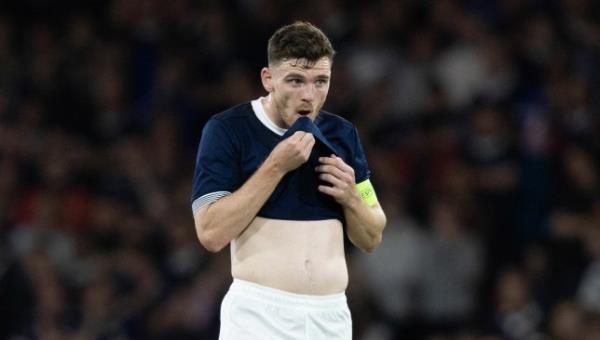 GLASGOW, SCOTLAND - SEPTEMBER 12: Scotland's Andy Robertson looks dejected after his mistake led to his side co<em></em>nceding a second goal during the 150th Anniversary Heritage Match between Scotland and England at Hampden Park, on September 12, 2023, in Glasgow, Scotland. (Photo by Ross Parker / SNS Group)