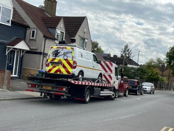 A ULEZ enforcement van being towed away from Maiden Lane, Crawford in London