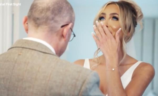 Ella and dad on her wedding day