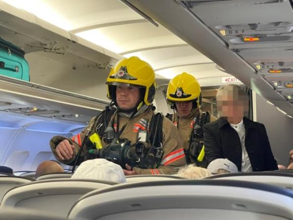 @JamesCheadleScenes at #Heathrow T5 as the BA flight from Barcelona has had its crew fall sick upon landing, and the passengers are being held on the runway