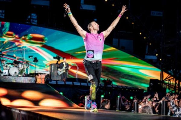 British singer Chris Martin of British band Coldplay performs at Parken Stadium in Copenhagen, Denmark, Wednesday July 5, 2023. The co<em></em>ncert is part of the Music of the Spheres World Tour. (Mads Claus Rasmussen/Ritzau Scanpix via AP)