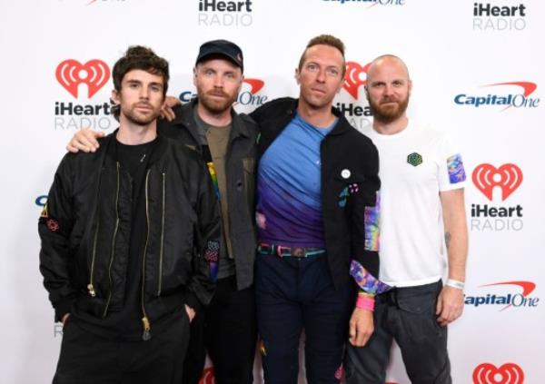 LAS VEGAS, NEVADA - SEPTEMBER 18: (L-R) Guy Berryman, Jo<em></em>nny Buckland, Chris Martin, and Will Champion of Coldplay attend the 2021 iHeartRadio Music Festival on September 18, 2021 at T-Mobile Arena in Las Vegas, Nevada. EDITORIAL USE o<em></em>nLY (Photo by David Becker/Getty Images for iHeartMedia)