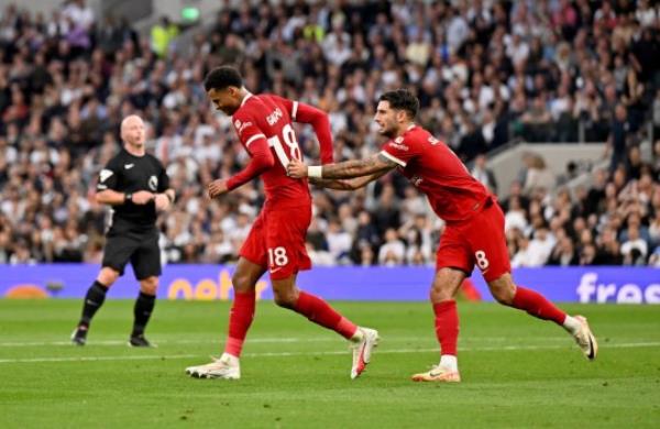 Liverpool's Cody Gakpo scores against Tottenham