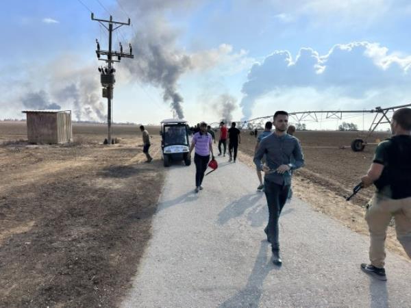 GAZA CITY, GAZA - OCTOBER 07: Smoke rises after Palestinian members of the Ezz Al-Din Al Qassam Brigades, the military wing of Hamas burn military armored vehicle belo<em></em>nging to Israeli forces near Gaza Strip, Gaza on October 07, 2023. (Photo by Ashraf Amra/Anadolu Agency via Getty Images)