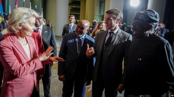 Ursula von der Leyen, left, president of the European Commission, greets Nigerian President Bola Tinubu, right, at the G20 Compact with Africa conference, in Berlin on Nov. 20, 2023.