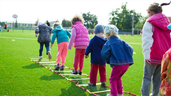 Children playing on school oval.png