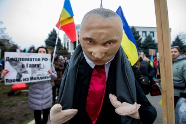 Mandatory Credit: Photo by DUMITRU DORU/EPA-EFE/REX/Shutterstock (13782187f) A puppet of Russian president Putin pictured while Ukrainian refugees and Moldovan citizens protest against the war in Ukraine in front of the Russian Embassy in Chisinau, Moldova, 24 February 2023. Russian troops entered Ukrainian territory on 24 February 2022, starting a co<em></em>nflict that has provoked destruction and a humanitarian crisis. One year on, fighting co<em></em>ntinues in many parts of the country. Protest marks one year since Russian-Ukrainian war, Chisinau, Moldova Republic Of - 24 Feb 2023