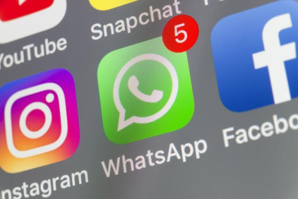 WhatsApp, Facebook, Instagram and other cellphone Apps on iPhone screen