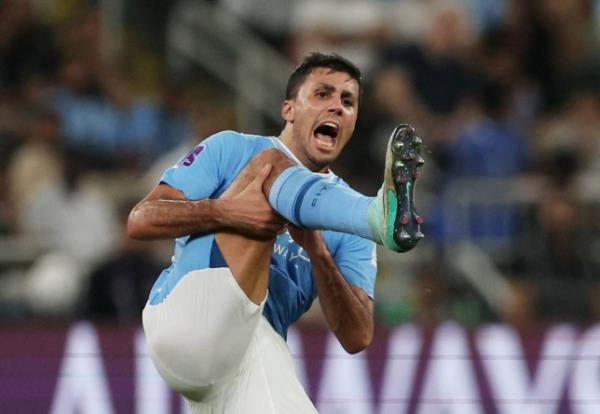 Soccer Football - Club World Cup - Final - Manchester City v Fluminense - King Abdullah Sports City, Jeddah, Saudi Arabia - December 22, 2023 Manchester City's Rodri reacts after sustaining an injury REUTERS/Amr Abdallah Dalsh